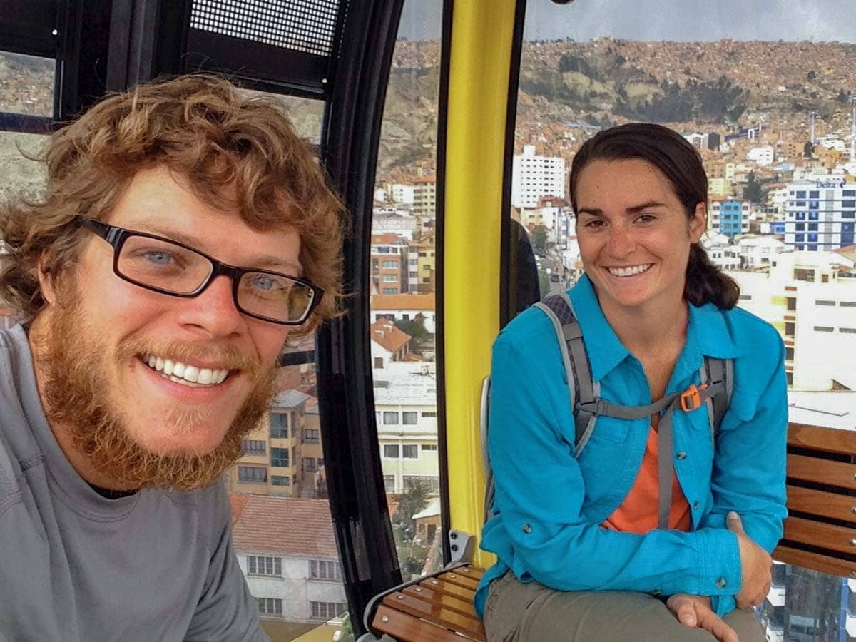 Young couple on cable car in bolivia.