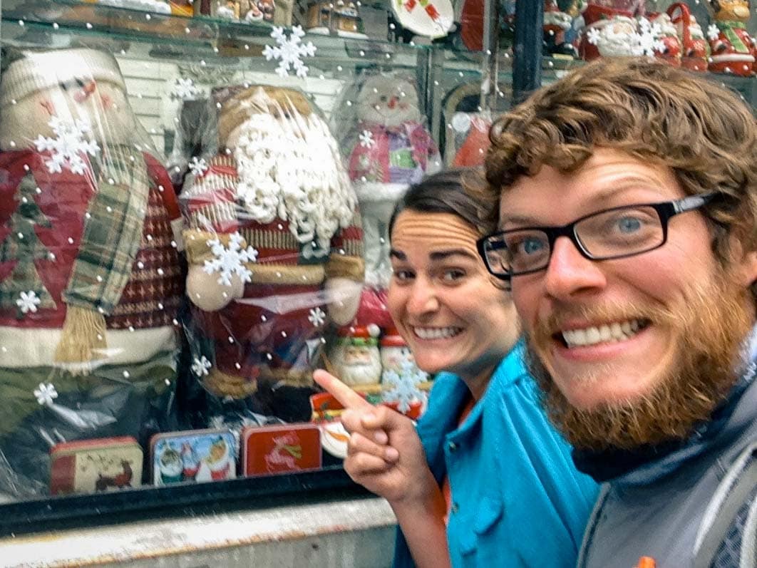 Christmas decor pointed out by young couple.