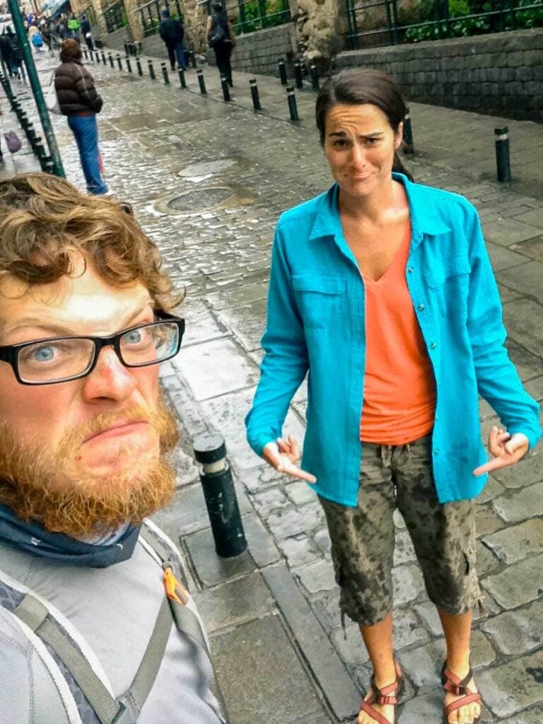 Young couple mad after getting sprayed by a car.