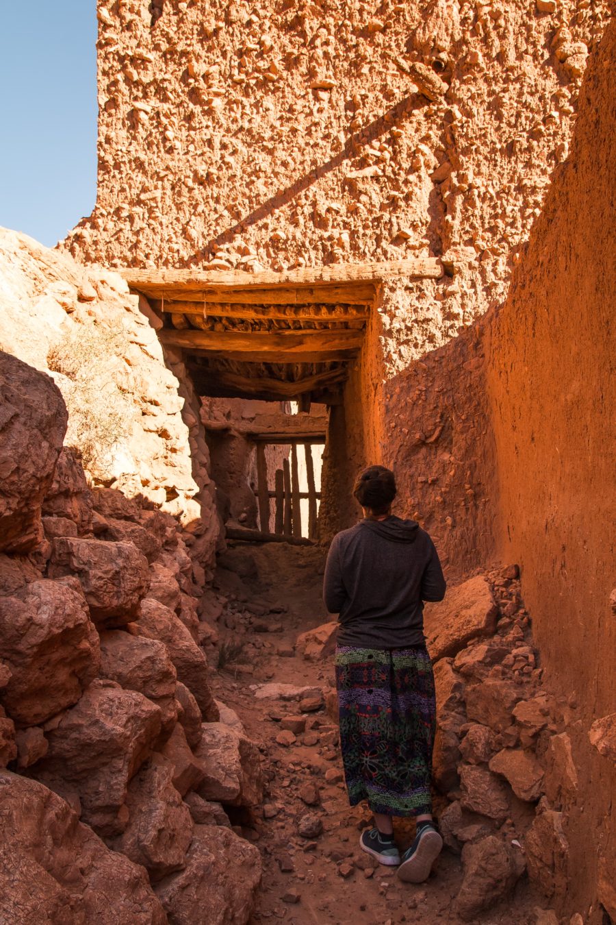 woman in Kasbah, Todra Gorge, ruins, arboursabroad