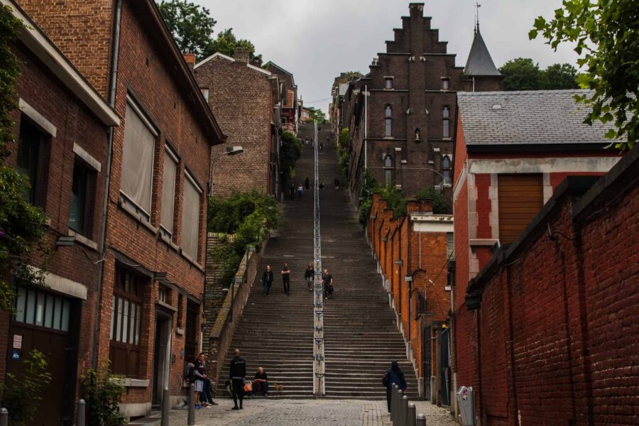 Large staircase in brick neighborhood.