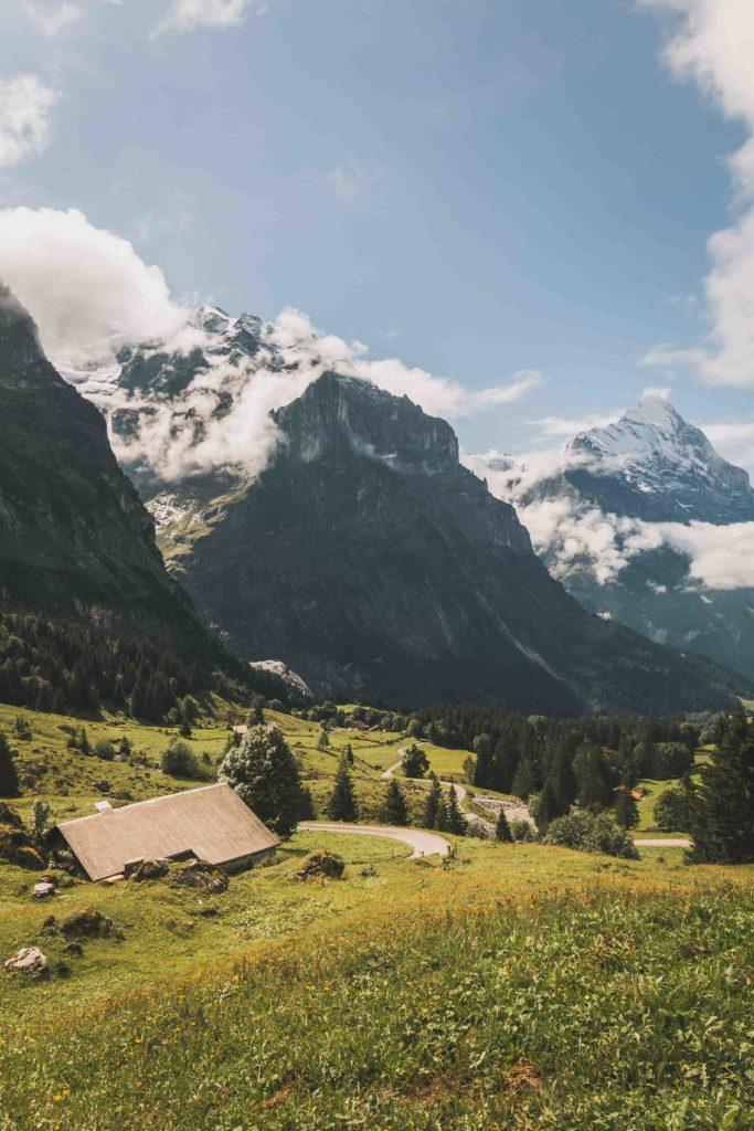 Grindelwald Pass, mountain home with peaks behind, Swiss homes, arboursabroad