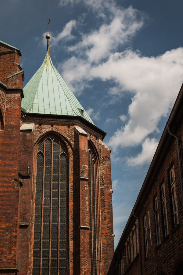 medieval buildings, lubeck, copper roofs, brick building, arboursabroad