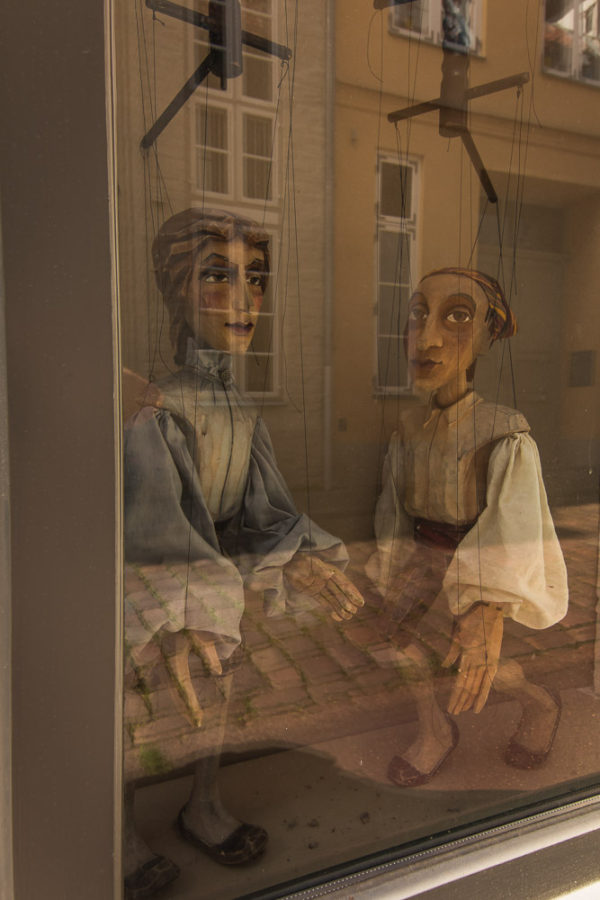 puppets in a window, showcased puppets, Germany, arboursabroad, visit Lubeck