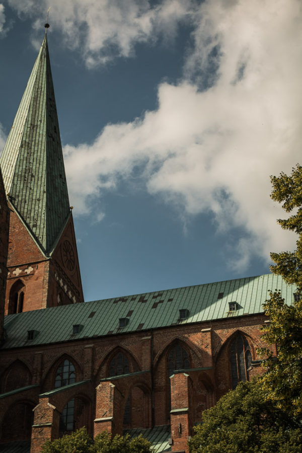 UNESCO site in Lubeck, ancient buildings, copper roof, arboursabroad
