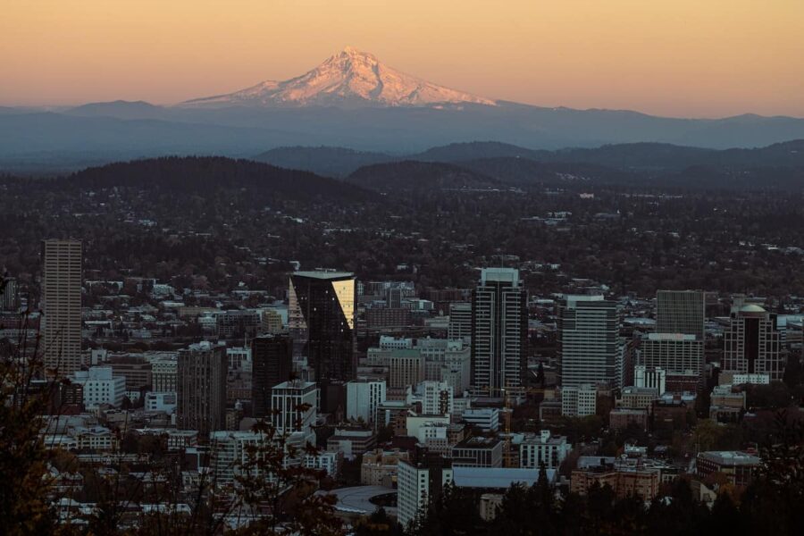 View or portland oregon with snow cover mountain in distance.