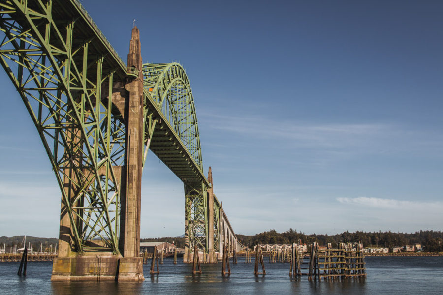 Yaquina Bay Bridge in Newport Oregon, green bridge over Pacific Ocean Bay, ArboursAbroad