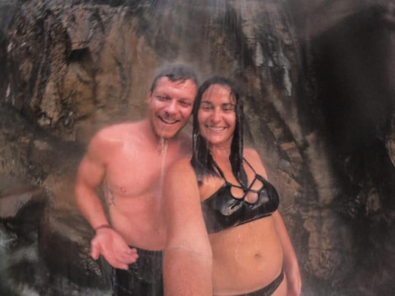 couple in waterfall with gopro, arboursabroad