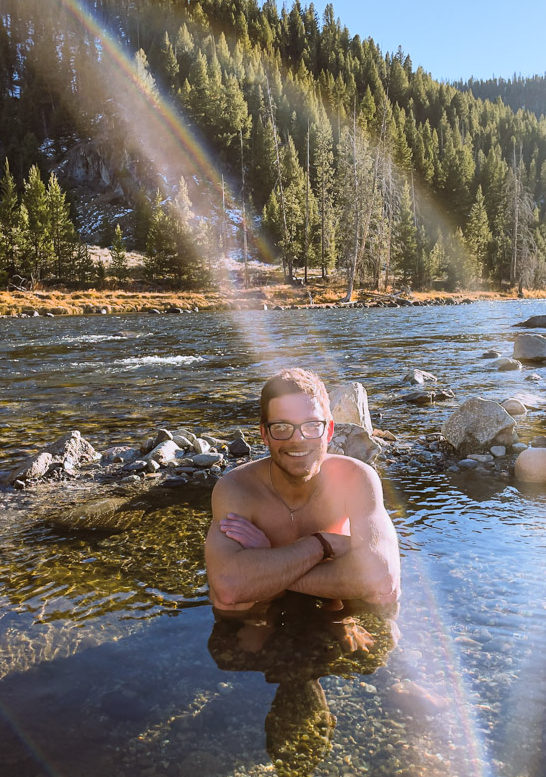 Boat Box Hot Spring, man sitting in rock pool in river, arboursabroad