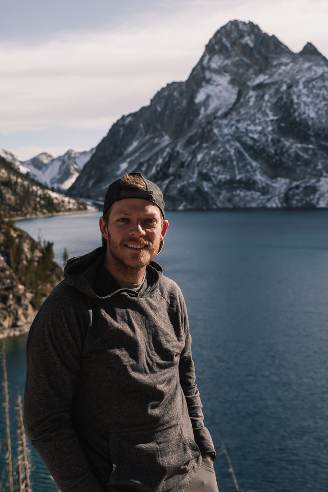 man at Sawtooth Lake, hiking in Stanley, ArboursAbroad