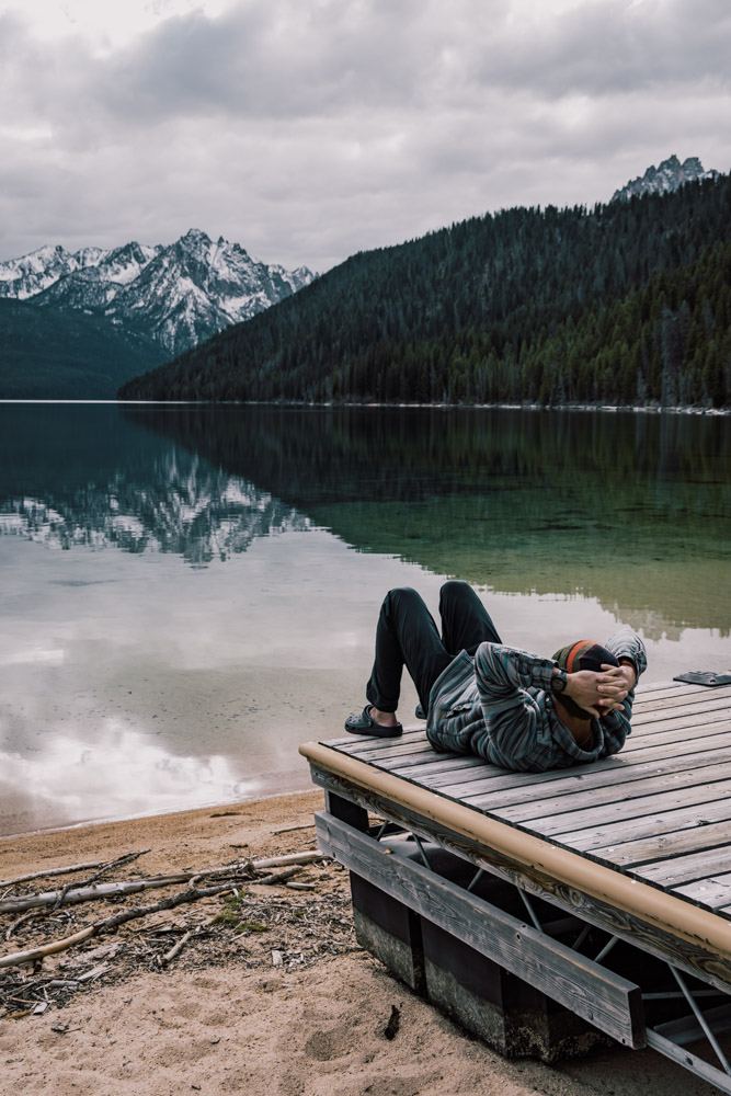 man relaxing at Redfish Lake, Sawtooth Wilderness, Stanley Idaho, arboursabroad