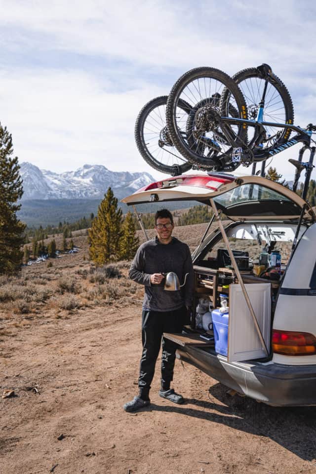 man making coffee with mountain view behind, vanlife, arboursabroad, Idaho