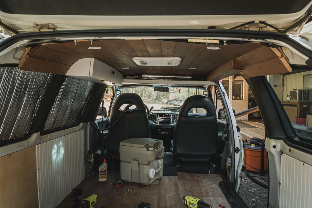 looking into a minivan camper conversion from the back of the van, arboursabroad