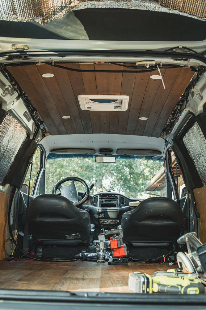 dark wood ceiling in minivan camper conversion, Arboursabroad