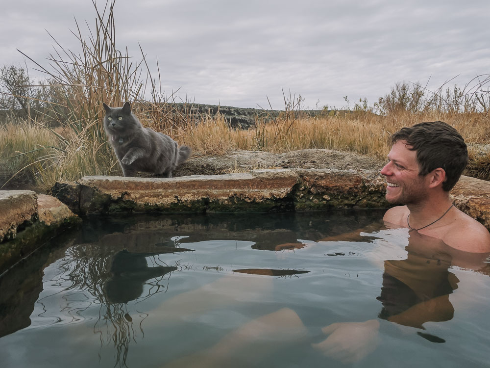 cat and man in hot springs, ArboursAbroad, Utah, Vanlife