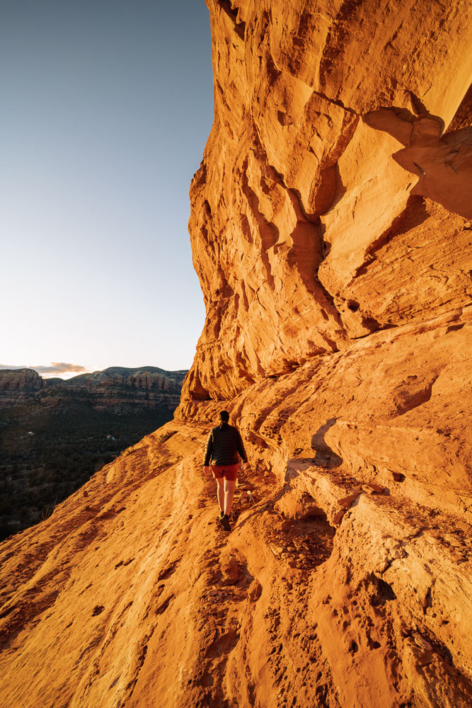 Best Sunset hikes Sedona, Altar Cave, ArboursAbroad, Sedona, Arizona, woman on rocks