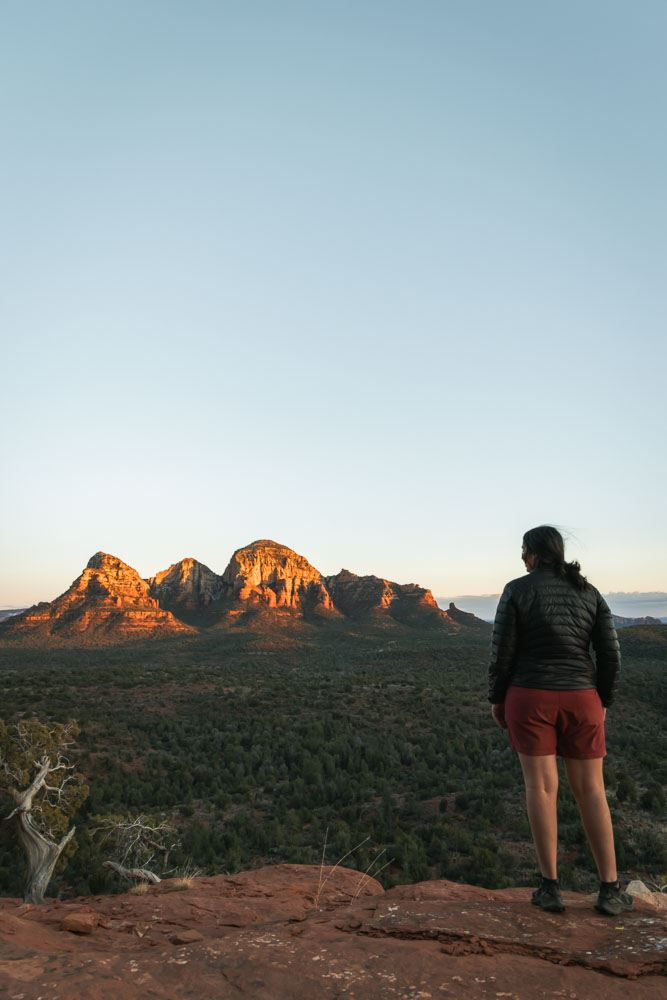 Sedona sunset views, best sunset hikes Sedona, ArboursAbroad, woman watching sunset