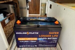 Goldenmate 12v 100ah LiFePO4 Battery sitting in campervan minivan before getting installed.