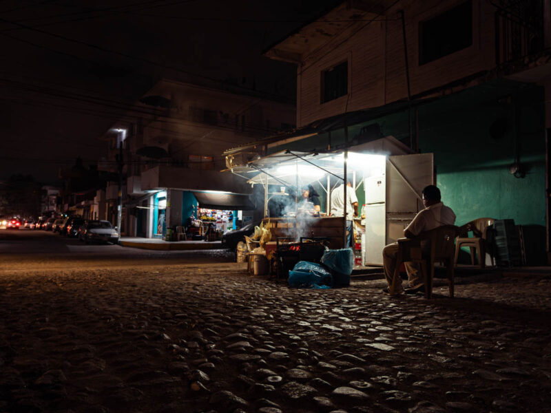 A night shot of Vamos con Pepe, a tradtional street taco stand in Puerto Vallarta Mexico.