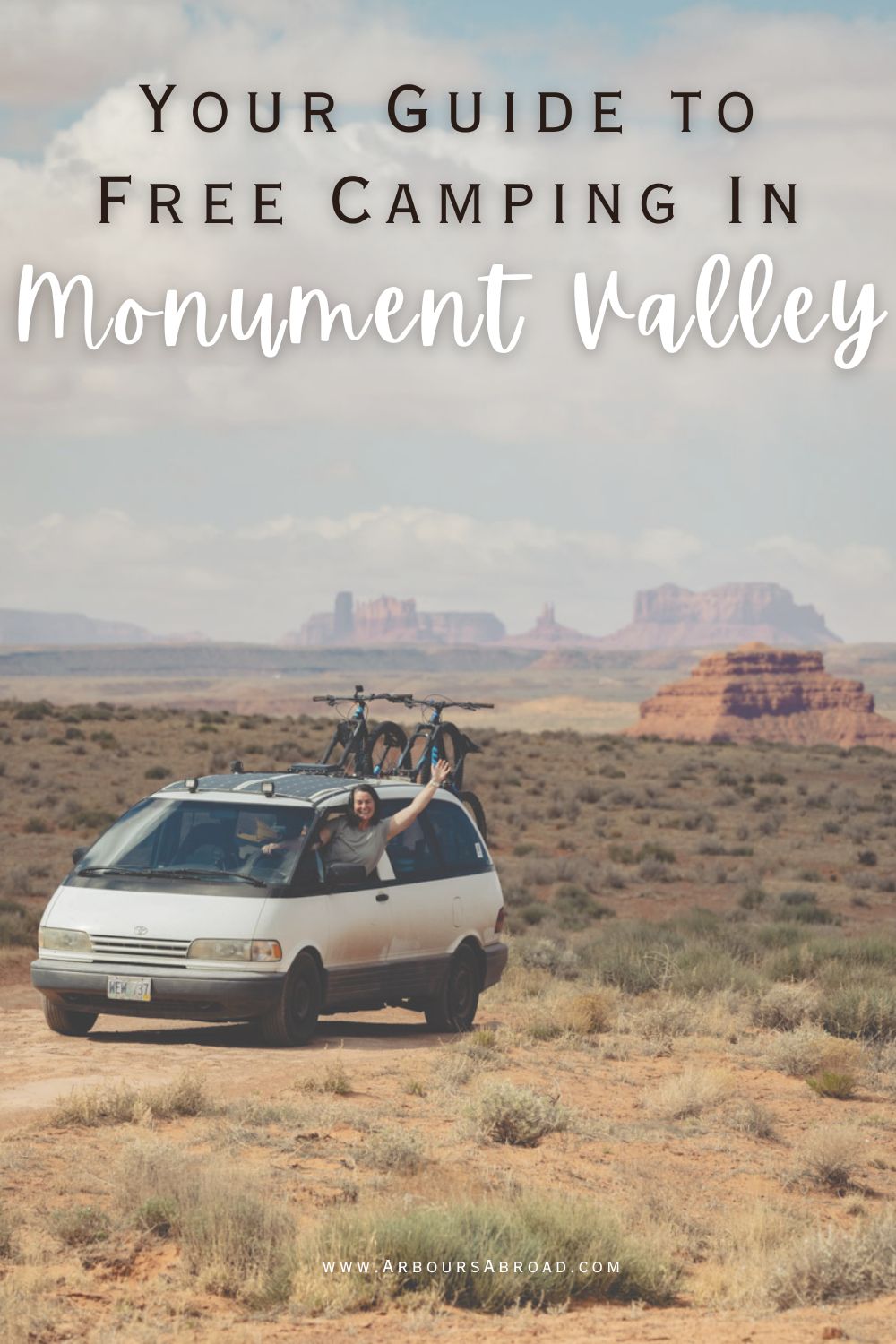 Your Guide to Free Camping in Monument Valley with van parked in Valley of the Gods with Monument valley in background.