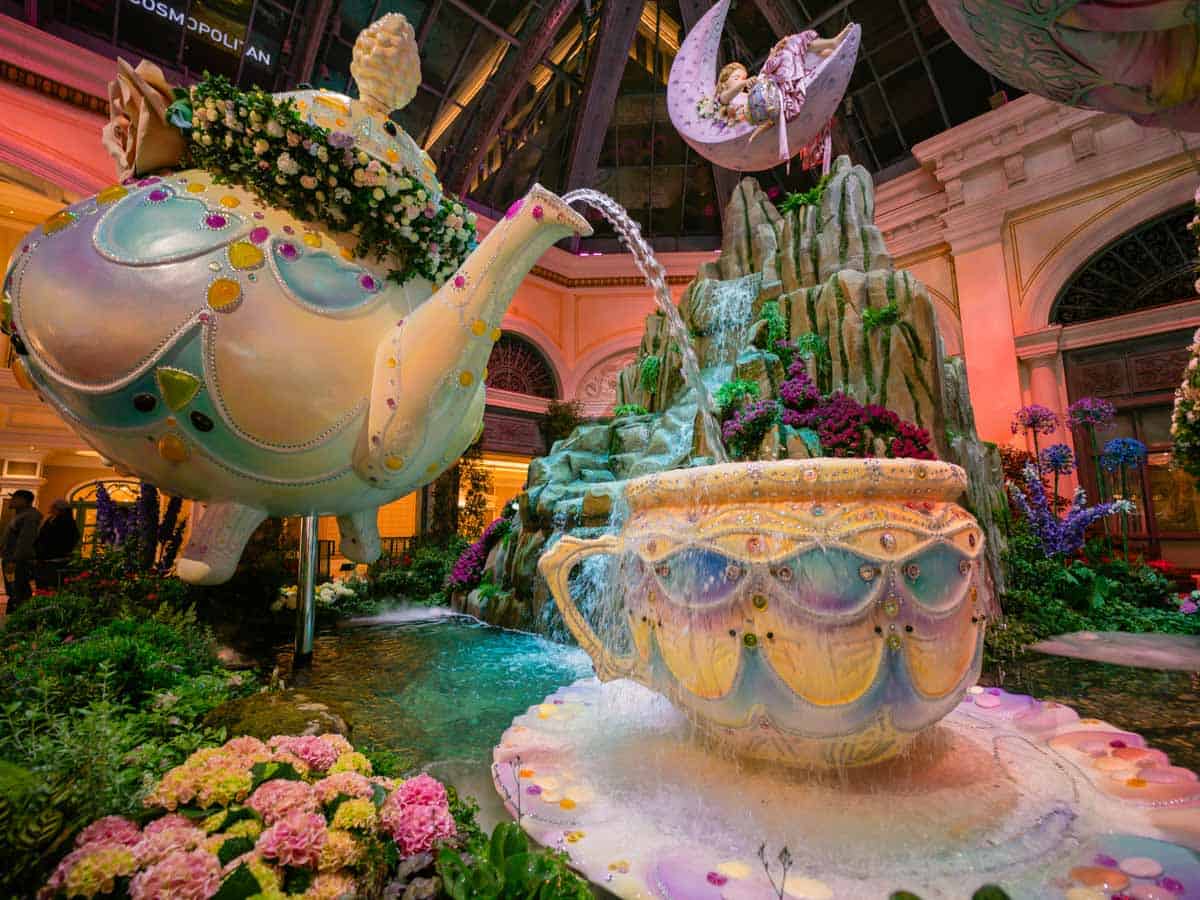 A giant tea pot pouring water into a cup at the Bellagio Botanical Gardens in Las Vegas