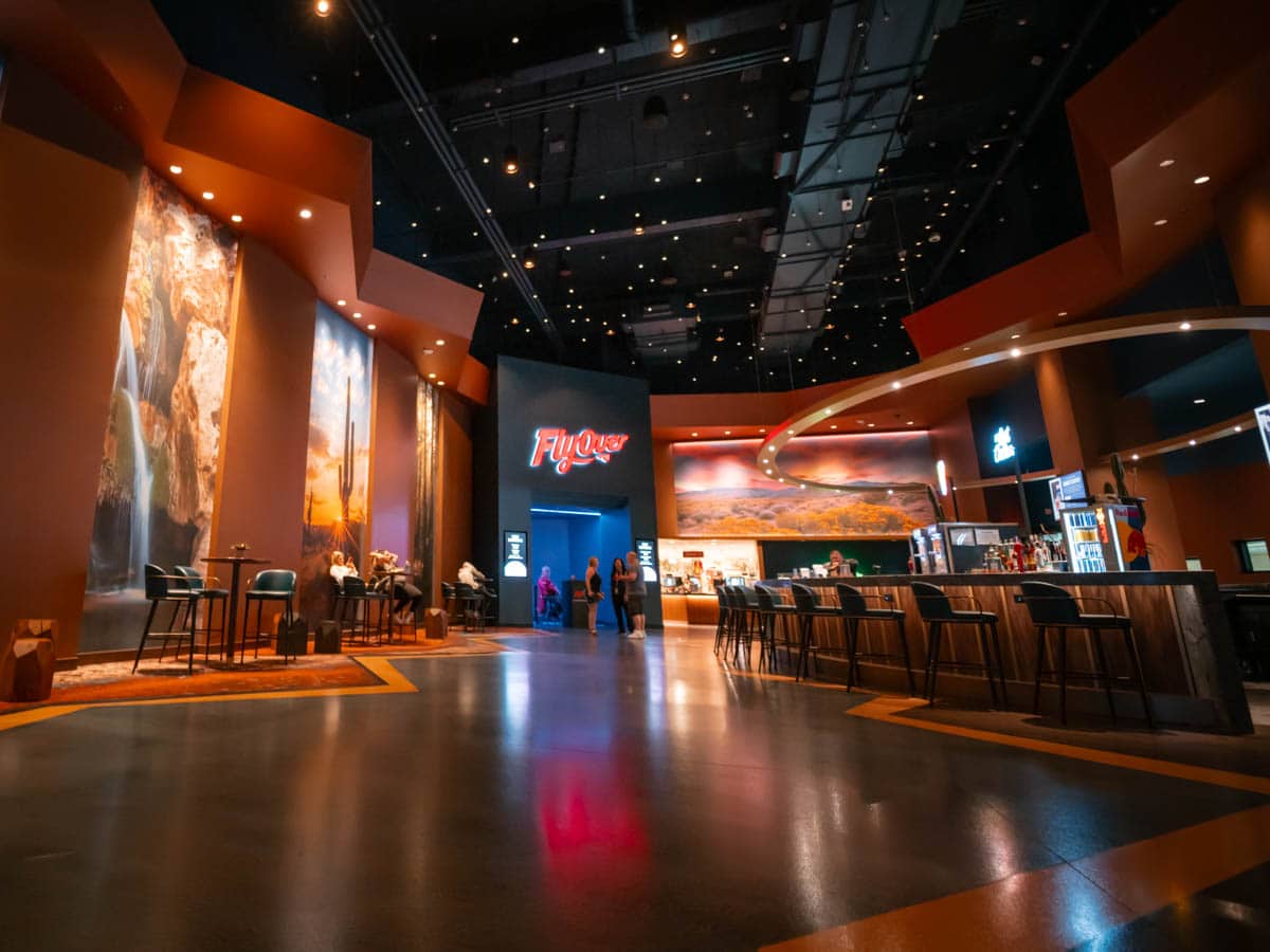 Inside the Flyover Las Vegas building with the Lost Cactus Bar and empty chairs.