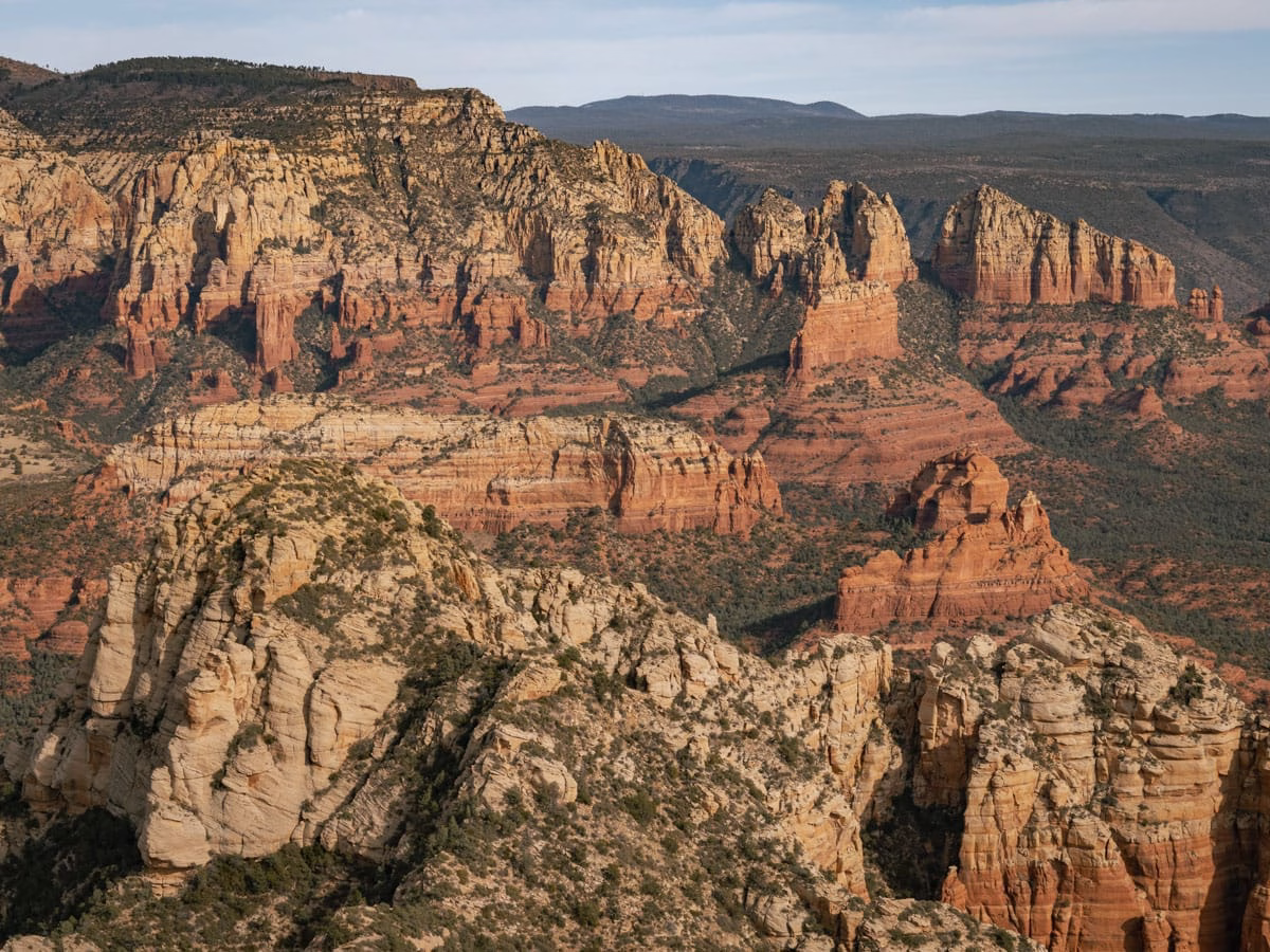 Looking down into the Red Rock Wilderness in Sedona from the summit of Capitol Butte, a short hike in Sedona that's very extreme.