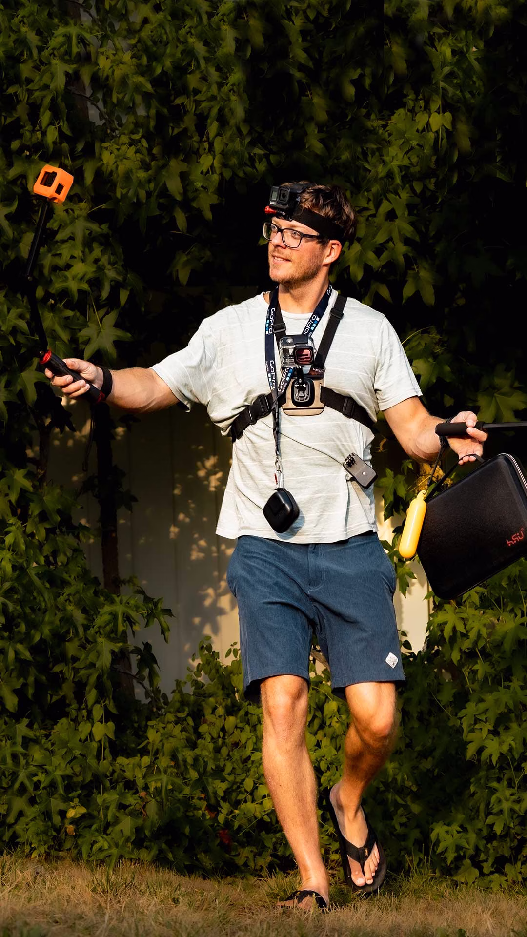 Jason wearing multiple gopro action camera accessories on his body.