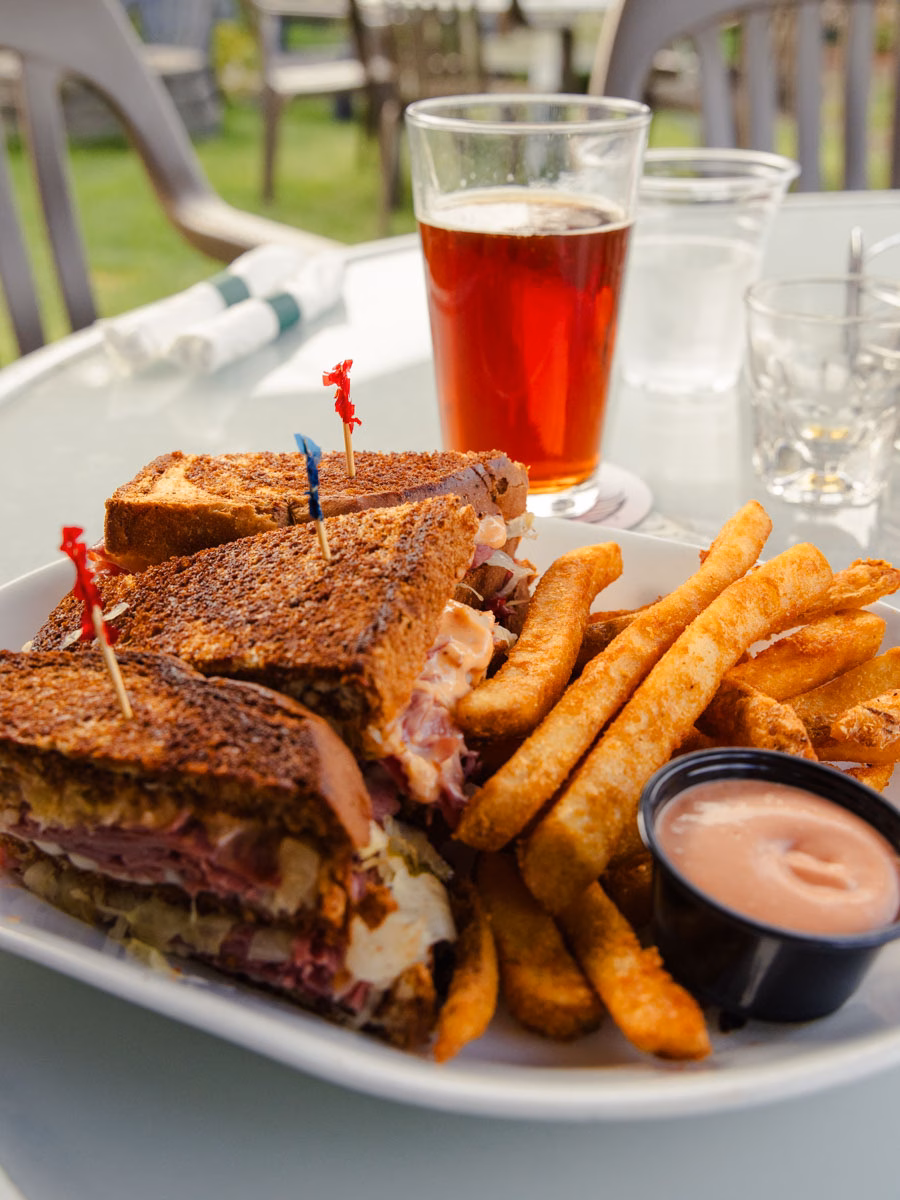 Reuben sandwich and fries served with a beer at Stubborn Mule in Joseph, Oregon